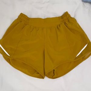 Gold Lululemon Hotty Hots 4 inch! (Size 6 tall)